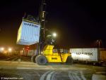 ID 6459 A trial containerised shipment of china clay is loaded aboard a train in Southampton's Western Docks, England.